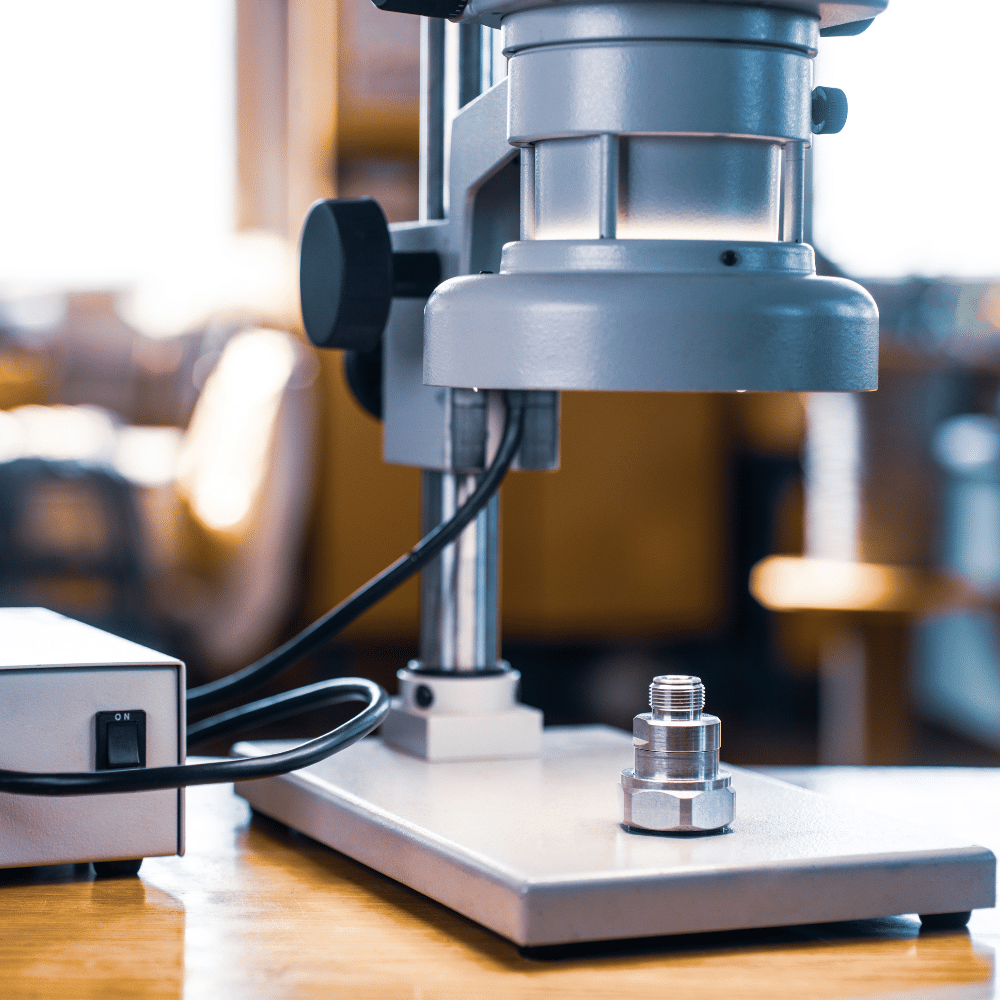 Industry clarity for electrical compliance - laboratory testing microscope inspecting metal component